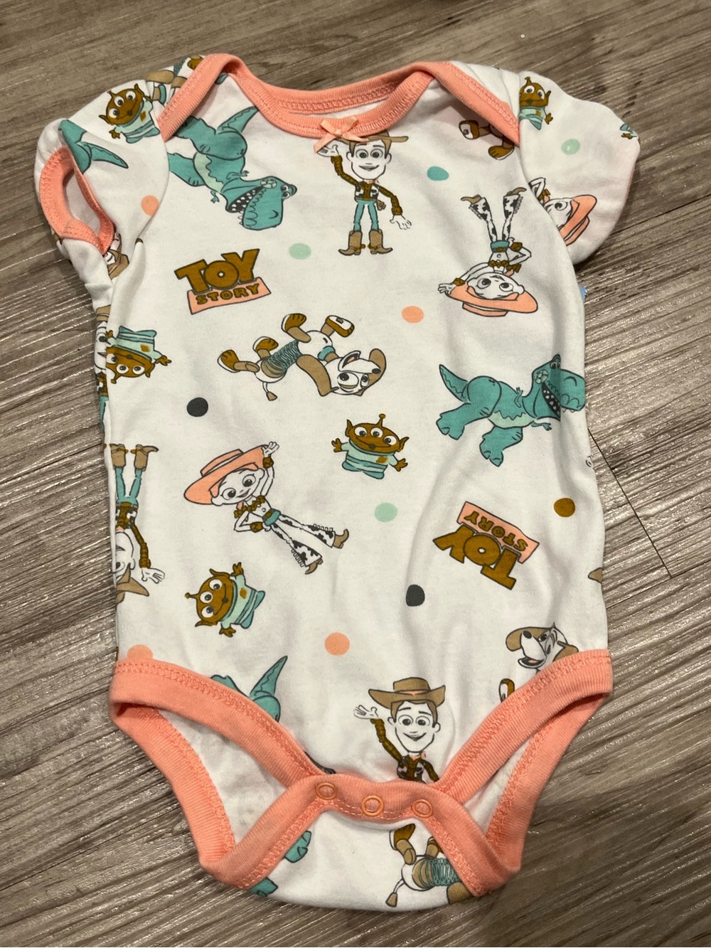 Disney Toy Story White & Coral Pink Character One-Piece Bodysuit
